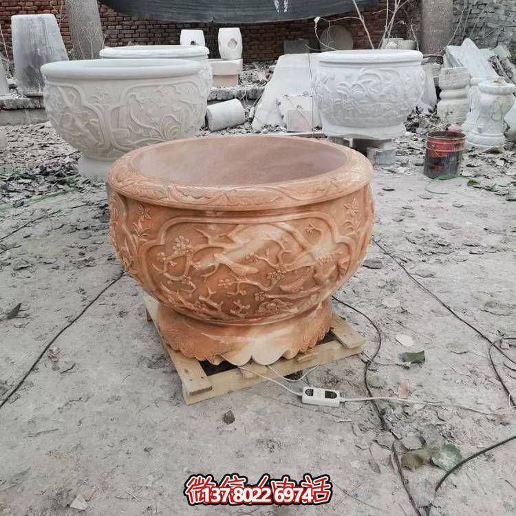 浮雕石雕晚霞景观花盆雕塑