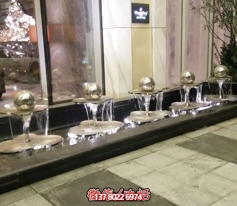 不锈钢镜面小型喷泉雕塑——点缀售楼部的精致之美 不锈钢镜面小型喷泉雕塑——点缀售楼部的精致之美