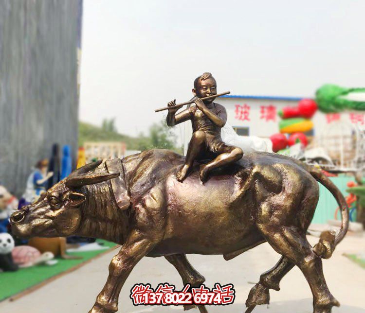 广场铜雕牧童骑牛吹笛的吹奏雕塑 广场铜雕牧童骑牛吹笛的吹奏雕塑