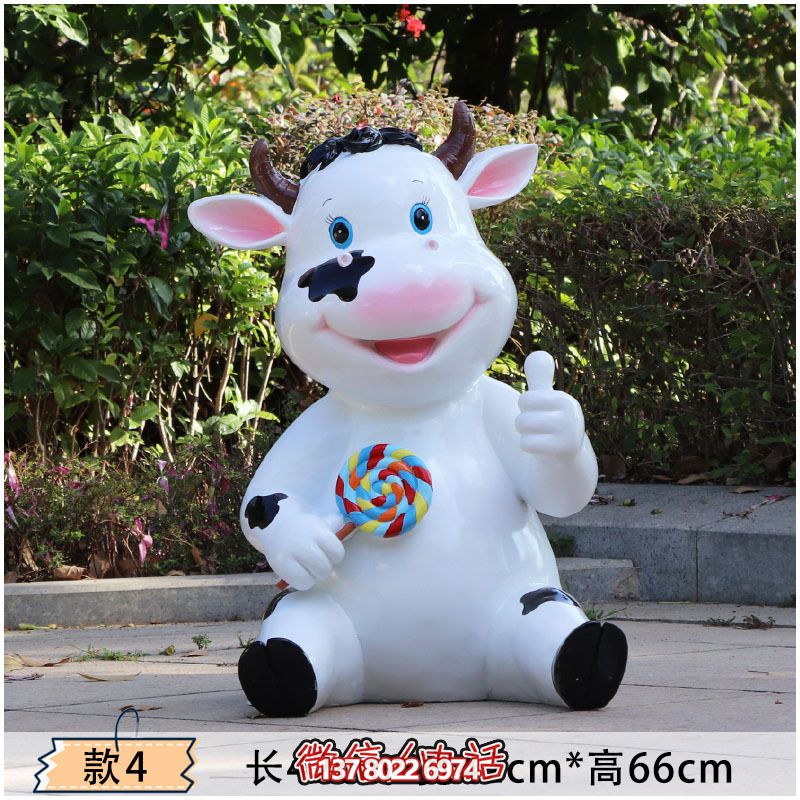 幼儿园一只拿棒棒糖的玻璃钢卡通牛雕塑 幼儿园一只拿棒棒糖的玻璃钢卡通牛雕塑