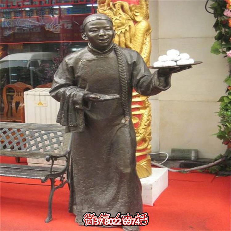 饭店门口摆放黄铜铸造店小二雕像引流小品