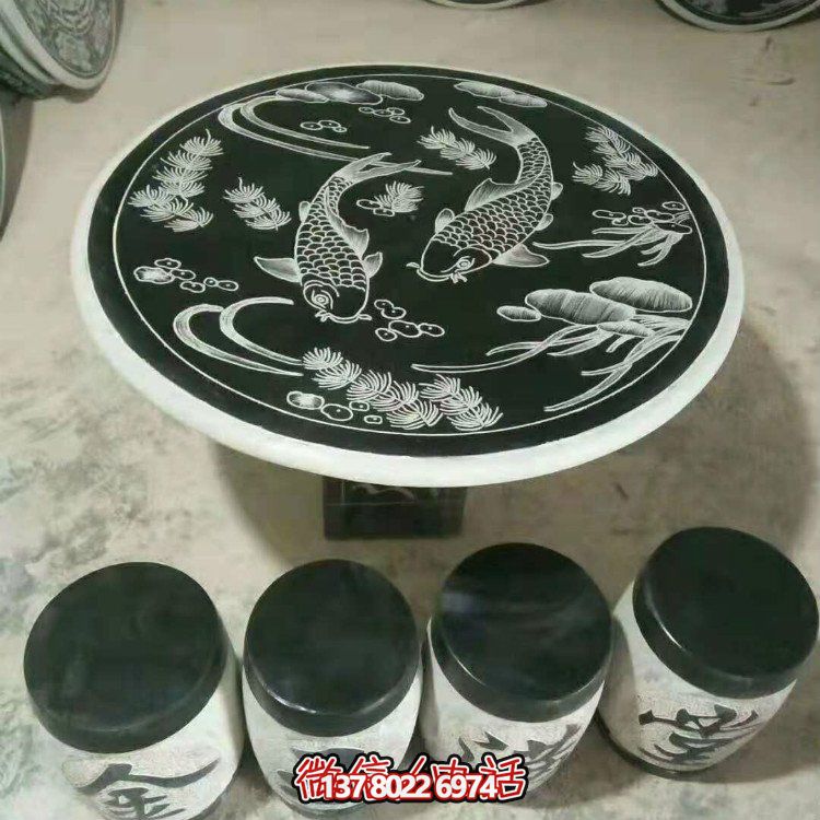 家用青石石雕浮雕双翼圆形石桌石凳雕塑