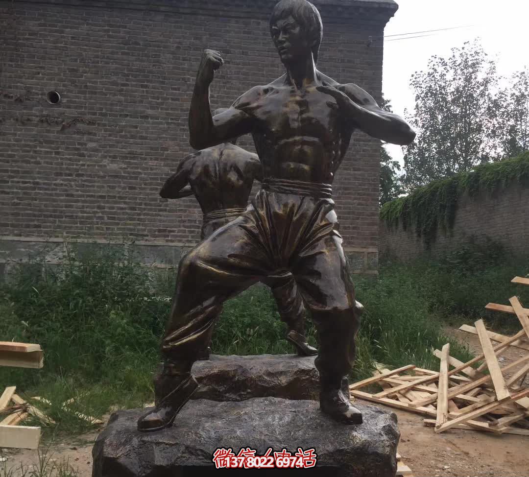 功夫之王李小龙广场玻璃钢仿铜雕塑 功夫之王李小龙广场玻璃钢仿铜雕塑