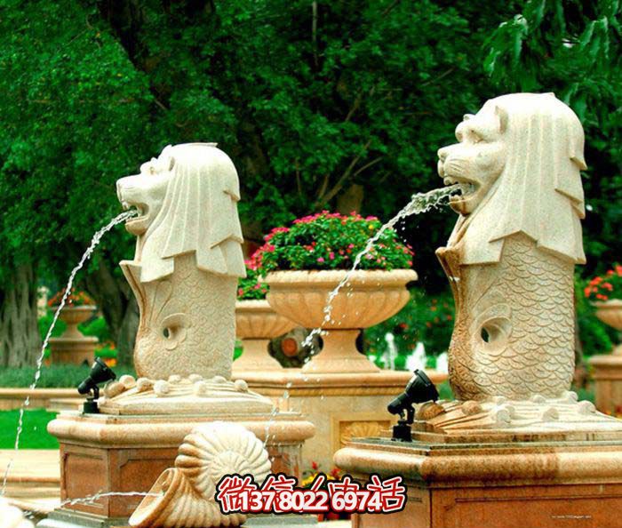 公园广场摆放的喷水黄蜡石石雕鱼尾狮雕塑 公园广场摆放的喷水黄蜡石石雕鱼尾狮雕塑