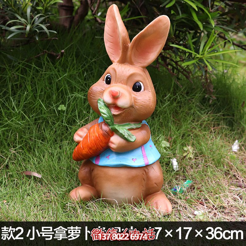 幼儿园一只拿胡萝卜的卡通兔子雕塑 幼儿园一只拿胡萝卜的卡通兔子雕塑