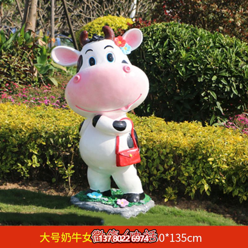 公园一只大号提包的玻璃钢牛雕塑 公园一只大号提包的玻璃钢牛雕塑